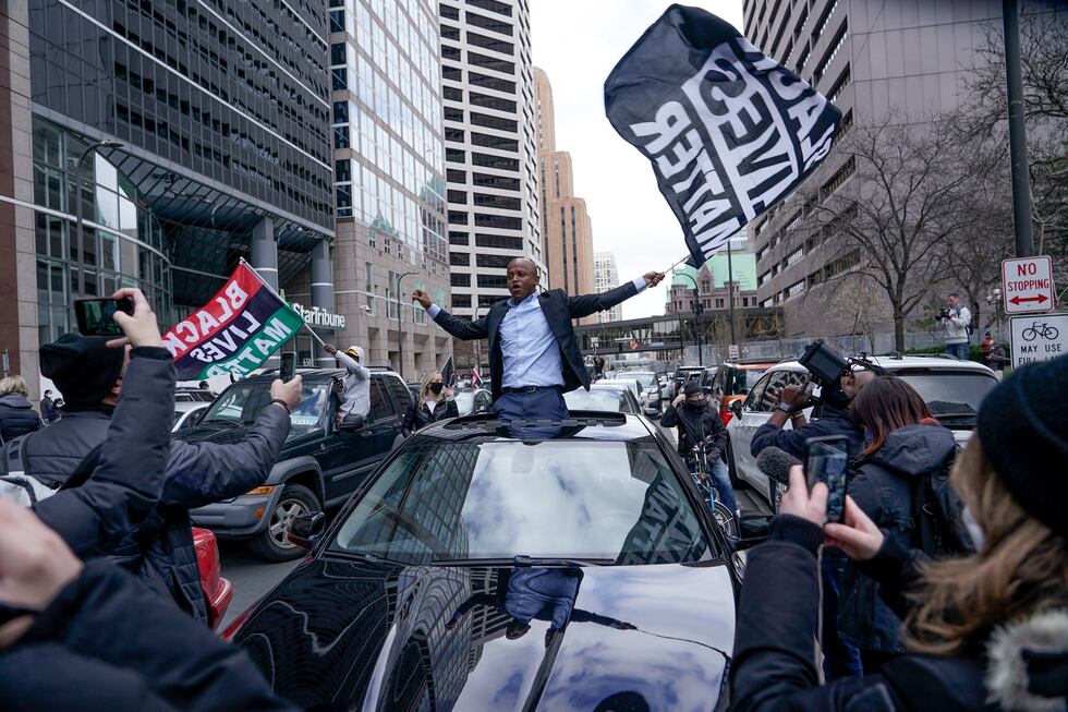 People rally outside the courthouse in Minneapolis on Tuesday, April 20, 2021, after the...