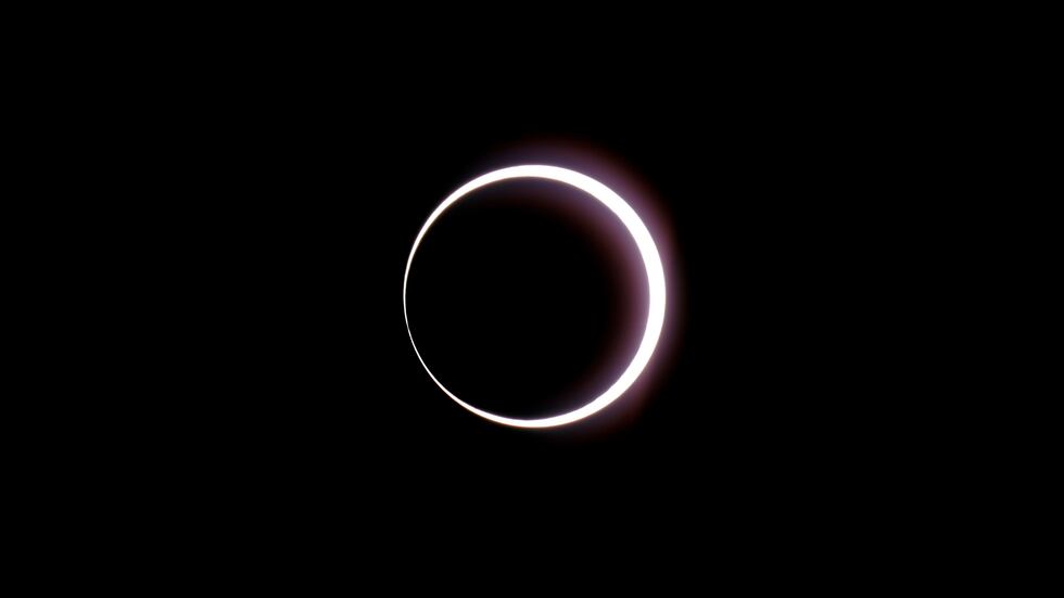 The moon passes between earth and the sun during a rare "ring of fire" eclipse of the sun...