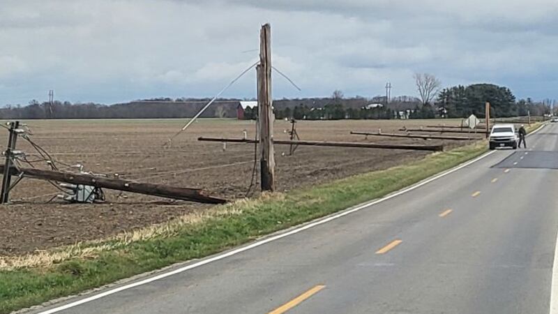 Winds knocked down several utility poles on State Route 18 in Defiance County