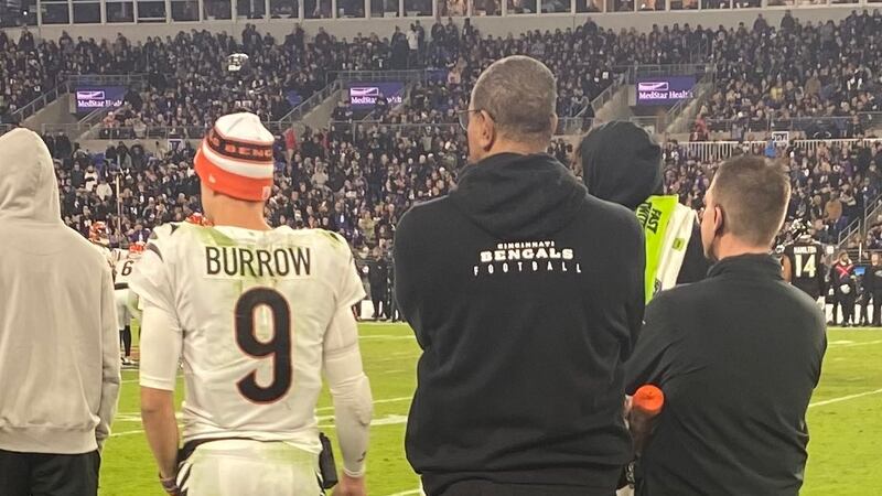 Joe Burrow watches from the sideline at M&T Bank Stadium after he injured his wrist during the...